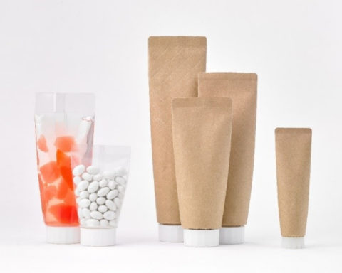Paper-based material for body of easy to squeeze tube-shaped pouch further reduces plastic volume.